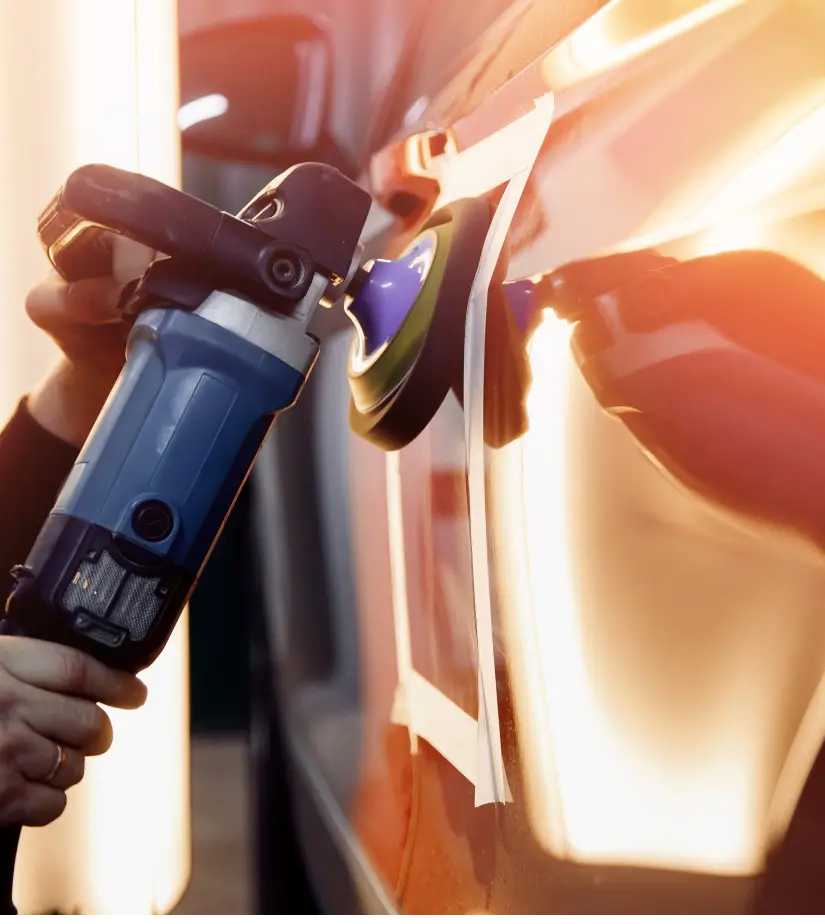 Man doing an auto detailing. High-gloss detailing and ceramic coating services for luxury cars at GB Motors Dallas
