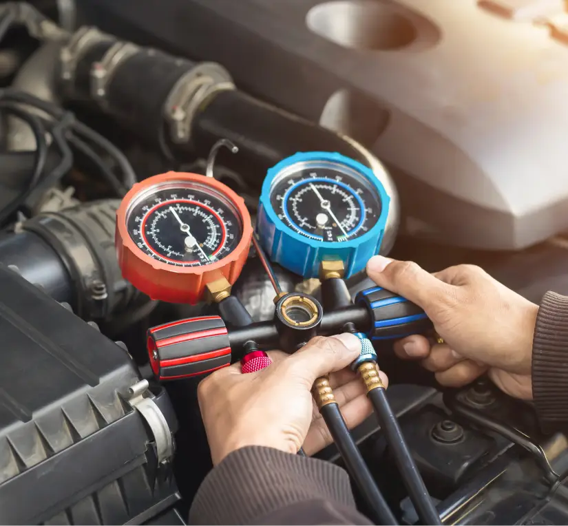 Photo of a man's hand doing an auto heater repair.